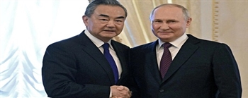 俄罗斯总统普京在圣彼得堡会见中国外长王毅:再确认十月访华